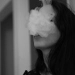 close-up photo of smoking woman
